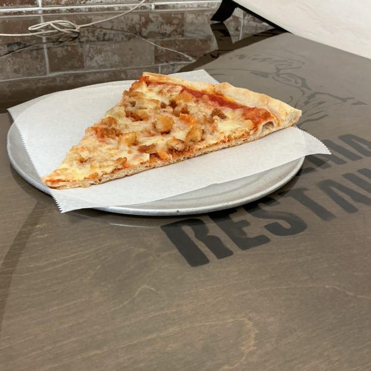 Slice Chicken Parm.